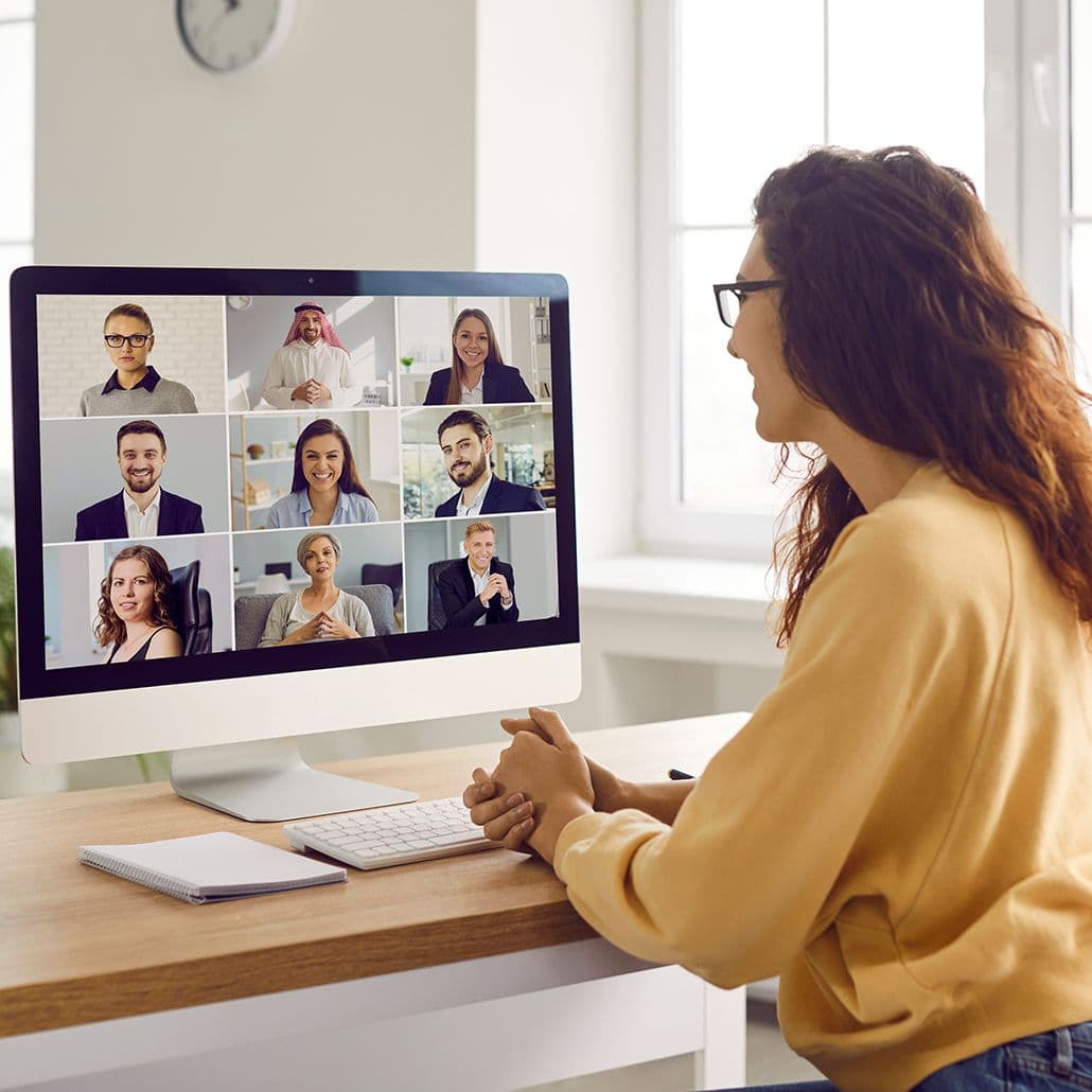 Employee engaging remotely with team, fostering collaboration and teamwork